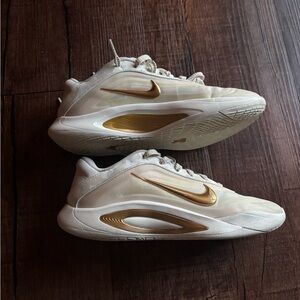 Nike Cream and Gold Metallic Swoosh Athletic Sneakers